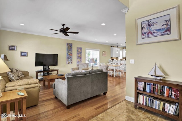 421 30th St, Sunset Beach, NC 28468 - living room featuring a ceiling fan, crown molding, light wood-type flooring, recessed lighting, and baseboards