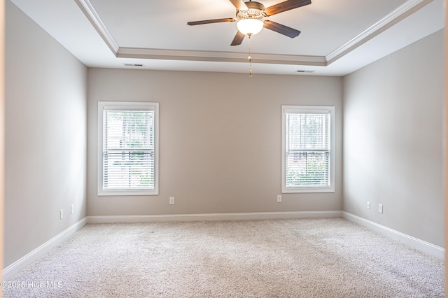 255 Champions Ridge Dr, Southern Pines, NC 28387 - carpeted spare room with a tray ceiling, healthy amount of natural light, ceiling fan, crown molding, and baseboards