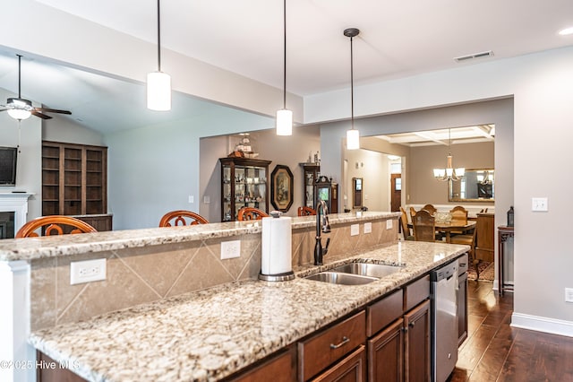 255 Champions Ridge Dr, Southern Pines, NC 28387 - kitchen with a sink, a ceiling fan, stainless steel dishwasher, dark wood finished floors, and open floor plan
