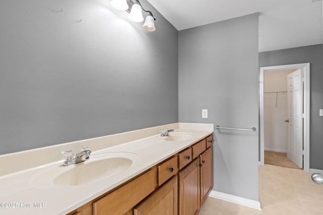 770 Heather Glen Ln, Calabash, NC 28467 - full bathroom with baseboards, double vanity, and a spacious closet