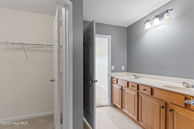 770 Heather Glen Ln, Calabash, NC 28467 - bathroom featuring a spacious closet and double vanity