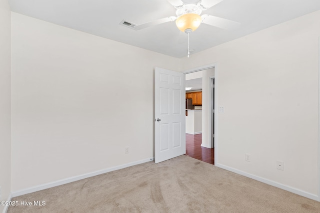 770 Heather Glen Ln, Calabash, NC 28467 - unfurnished room featuring carpet floors, baseboards, and a ceiling fan