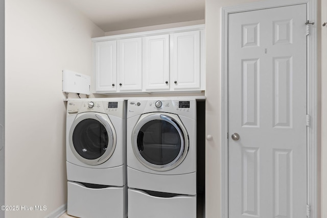 770 Heather Glen Ln, Calabash, NC 28467 - laundry area featuring washing machine and clothes dryer, cabinet space, and baseboards