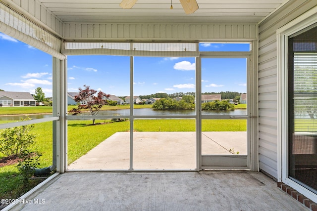 770 Heather Glen Ln, Calabash, NC 28467 - unfurnished sunroom featuring a water view, a ceiling fan, and a residential view