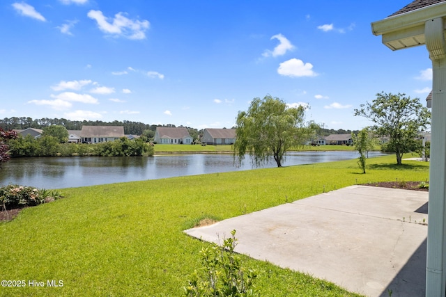 770 Heather Glen Ln, Calabash, NC 28467 - view of green lawn featuring a water view, a residential view, and a patio