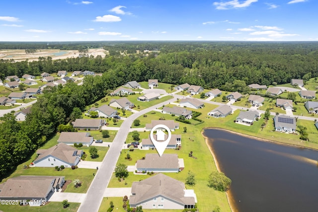 770 Heather Glen Ln, Calabash, NC 28467 - aerial view of residential area with a nearby body of water and a heavily wooded area