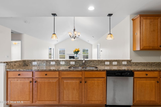 770 Heather Glen Ln, Calabash, NC 28467 - kitchen with dishwasher, a sink, dark stone counters, decorative light fixtures, and vaulted ceiling