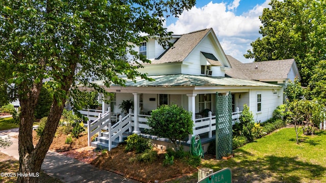 1402 Shepard St, Morehead City, NC 28557 - view of front of property featuring covered porch and a shingled roof