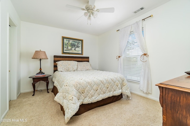 1402 Shepard St, Morehead City, NC 28557 - carpeted bedroom with baseboards and a ceiling fan