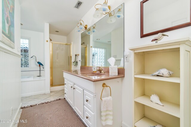 1402 Shepard St, Morehead City, NC 28557 - bathroom featuring a shower stall, vanity, tile patterned floors, and plenty of natural light