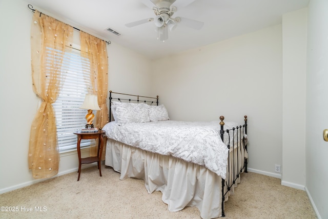1402 Shepard St, Morehead City, NC 28557 - bedroom featuring carpet floors, baseboards, and a ceiling fan