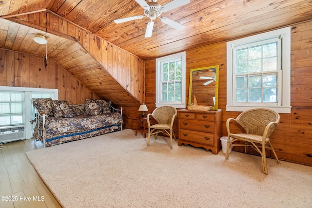 1402 Shepard St, Morehead City, NC 28557 - bedroom with wooden walls, wood ceiling, lofted ceiling, wood-type flooring, and a ceiling fan