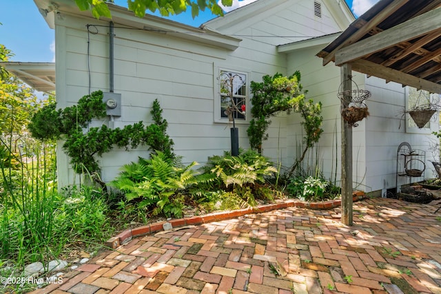 1402 Shepard St, Morehead City, NC 28557 - view of home's exterior featuring a patio