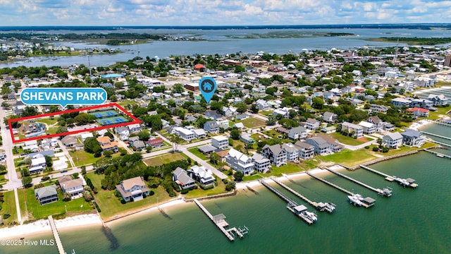 1402 Shepard St, Morehead City, NC 28557 - aerial perspective of suburban area featuring a nearby body of water and property parcel outlined