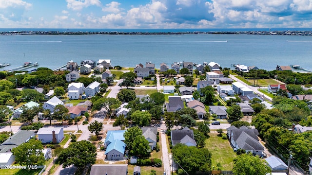 1402 Shepard St, Morehead City, NC 28557 - aerial view of residential area with a large body of water, property parcel outlined, and a notable bridge