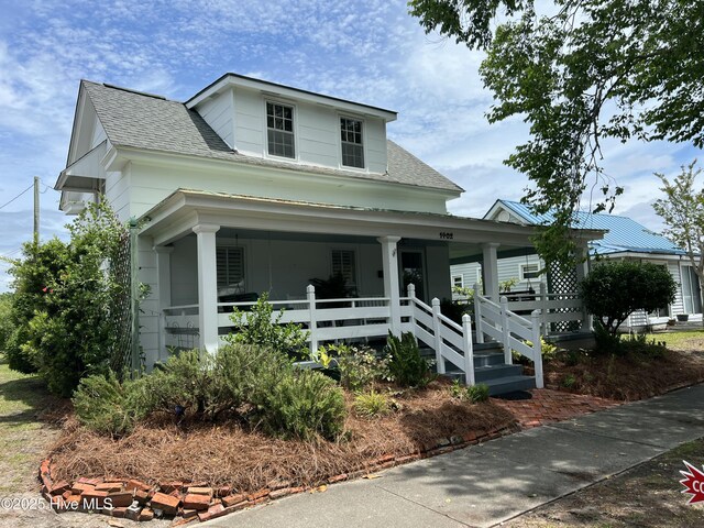 1402 Shepard St, Morehead City, NC 28557 - view of front of property featuring covered porch and a shingled roof
