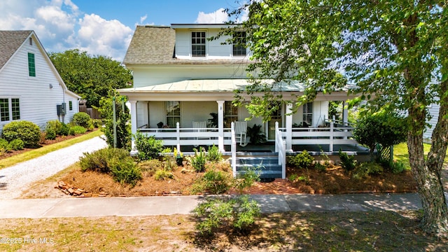 1402 Shepard St, Morehead City, NC 28557 - view of front facade featuring a porch and a standing seam roof