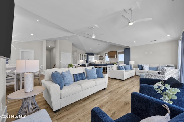145 Oceanview Ln, North Topsail Beach, NC 28460 - living room with a ceiling fan, vaulted ceiling, light wood-style floors, and recessed lighting