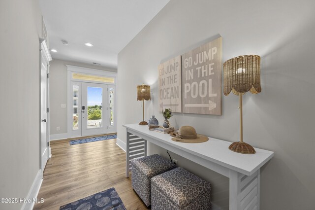 145 Oceanview Ln, North Topsail Beach, NC 28460 - entryway with baseboards, wood finished floors, and recessed lighting
