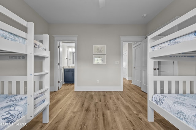 145 Oceanview Ln, North Topsail Beach, NC 28460 - unfurnished bedroom featuring wood finished floors and baseboards
