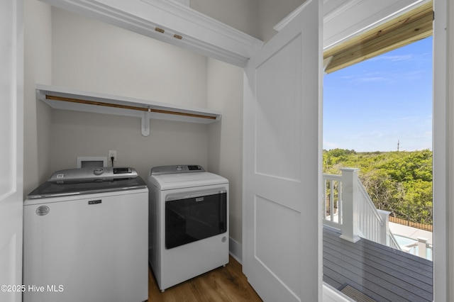145 Oceanview Ln, North Topsail Beach, NC 28460 - laundry area with independent washer and dryer and dark wood-style flooring