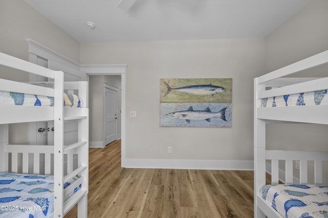 145 Oceanview Ln, North Topsail Beach, NC 28460 - bedroom featuring wood finished floors and baseboards