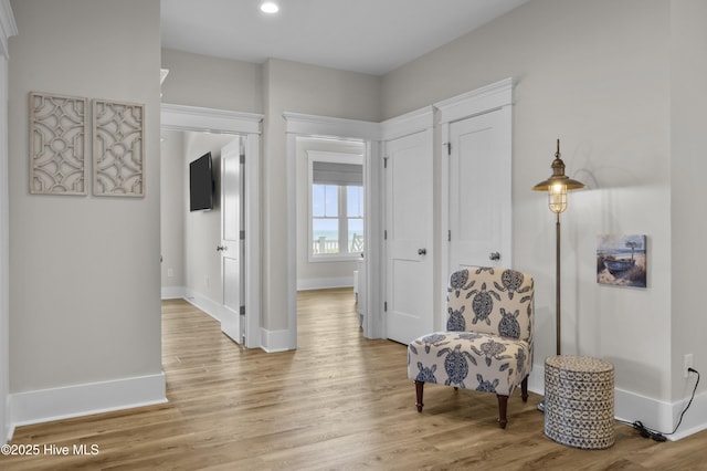 145 Oceanview Ln, North Topsail Beach, NC 28460 - living area with baseboards, light wood-style flooring, and recessed lighting