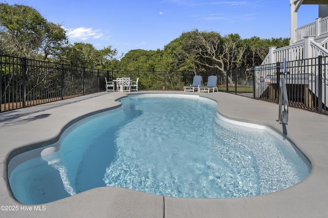 145 Oceanview Ln, North Topsail Beach, NC 28460 - view of swimming pool with a patio area
