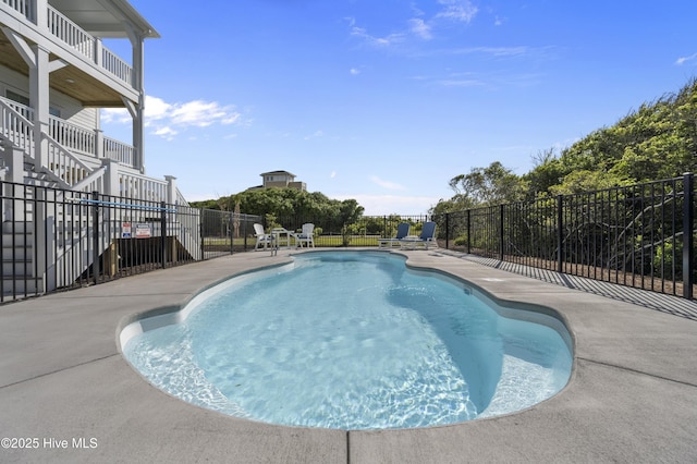 145 Oceanview Ln, North Topsail Beach, NC 28460 - view of swimming pool featuring stairway and a patio area