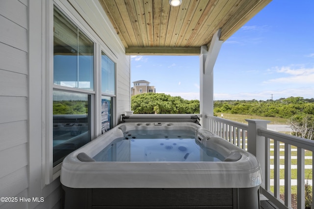 145 Oceanview Ln, North Topsail Beach, NC 28460 - balcony featuring a hot tub