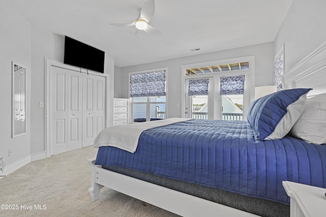 1102 Canal Dr Unit 1 & 2, Carolina Beach, NC 28428 - bedroom featuring access to outside, multiple windows, carpet, and ceiling fan