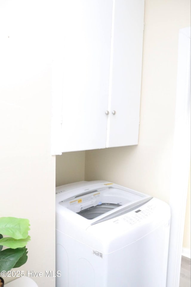 102 Nash St, Elm City, NC 27822 - washroom with washer / clothes dryer and cabinet space