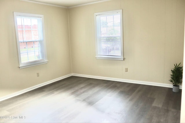 102 Nash St, Elm City, NC 27822 - unfurnished room featuring dark wood finished floors, ornamental molding, and healthy amount of natural light