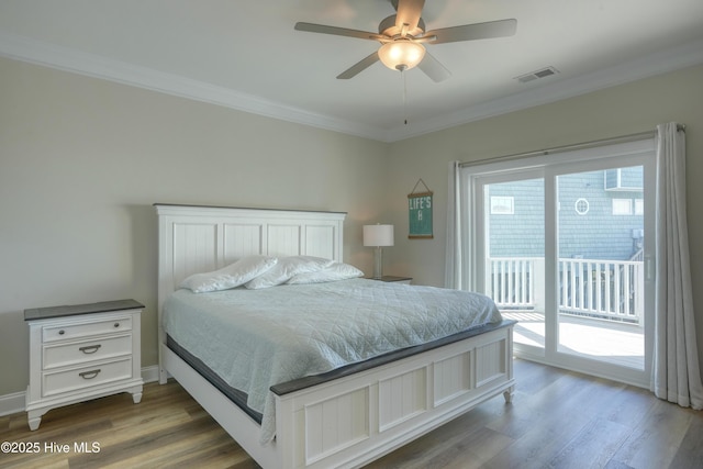 876-878 Villas Dr, North Topsail Beach, NC 28460 - bedroom with access to outside, wood finished floors, crown molding, and a ceiling fan