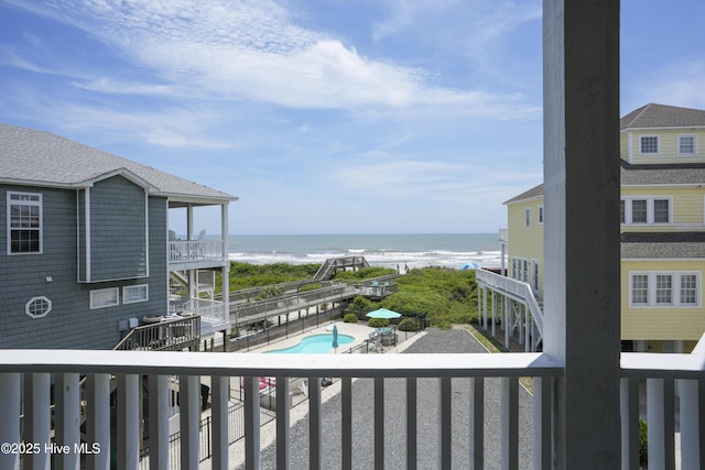 876-878 Villas Dr, North Topsail Beach, NC 28460 - balcony featuring a water view and view of pool