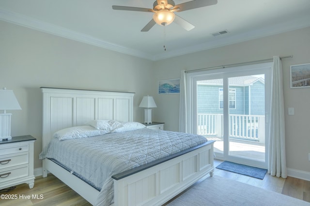 876-878 Villas Dr, North Topsail Beach, NC 28460 - bedroom featuring access to exterior, ornamental molding, light wood-style floors, baseboards, and a ceiling fan