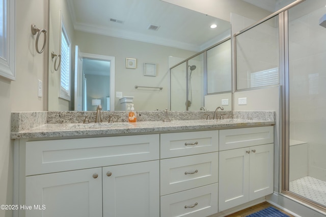 876-878 Villas Dr, North Topsail Beach, NC 28460 - bathroom featuring ornamental molding, double vanity, and a shower stall