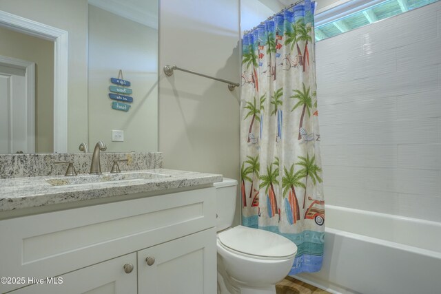 876-878 Villas Dr, North Topsail Beach, NC 28460 - full bathroom with vanity, toilet, and shower / bath combo with shower curtain