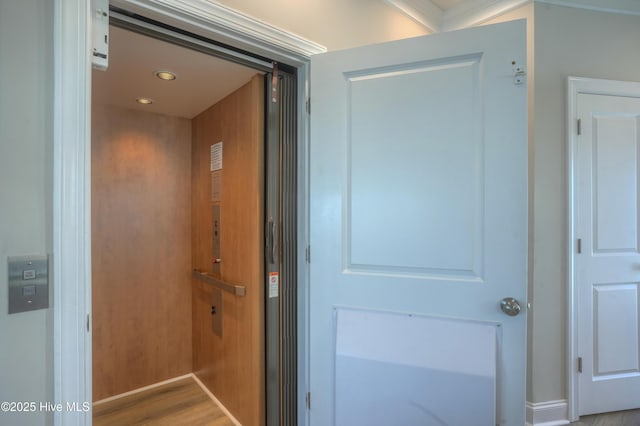 876-878 Villas Dr, North Topsail Beach, NC 28460 - elevator featuring wood finished floors and recessed lighting