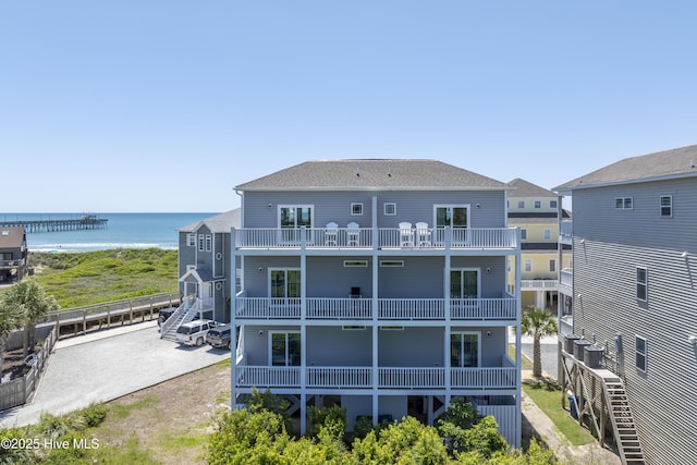 876-878 Villas Dr, North Topsail Beach, NC 28460 - back of house featuring a water view and a balcony