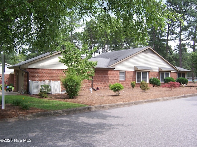 100 Pinehurst Trace Dr, Pinehurst, NC 28374 - view of front of home with brick siding
