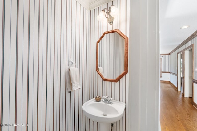 116 Spencer Ln, Newport, NC 28570 - bathroom featuring wood finished floors and crown molding