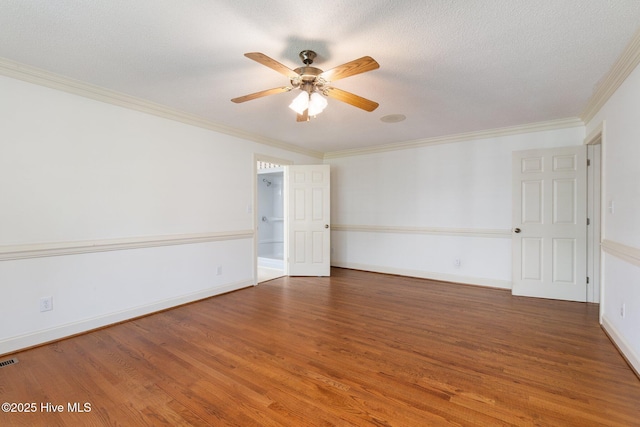 116 Spencer Ln, Newport, NC 28570 - empty room with wood finished floors, ceiling fan, and crown molding