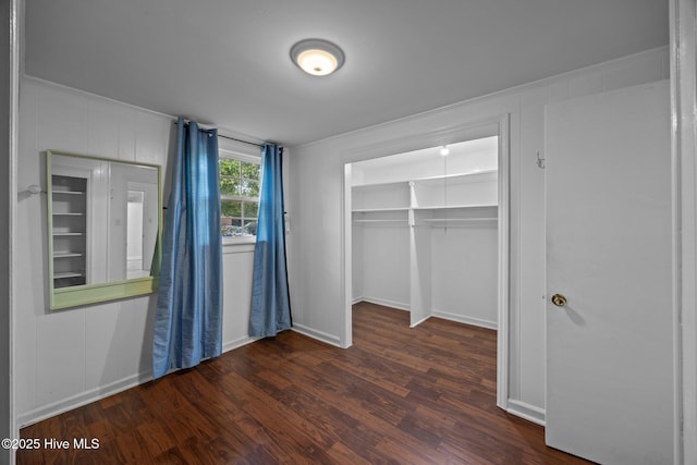 2411 Grace Ave, New Bern, NC 28562 - unfurnished bedroom featuring wood finished floors, a closet, and baseboards