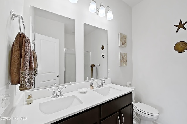 2106 Cass Lake Rd, Calabash, NC 28467 - full bathroom featuring double vanity, toilet, and a shower