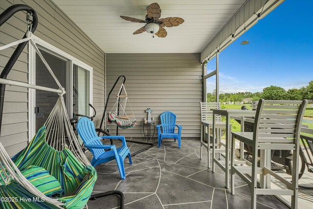 2106 Cass Lake Rd, Calabash, NC 28467 - view of patio featuring ceiling fan