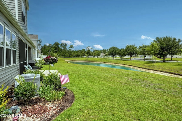 2106 Cass Lake Rd, Calabash, NC 28467 - view of green lawn featuring a water view