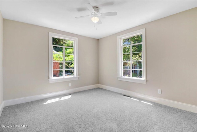 403 S Andrews Ave, Goldsboro, NC 27530 - carpeted empty room with baseboards and a ceiling fan