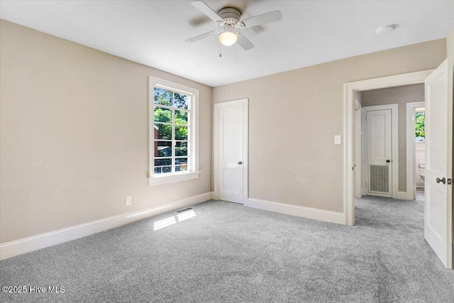 403 S Andrews Ave, Goldsboro, NC 27530 - empty room with carpet floors, ceiling fan, baseboards, and a smoke detector