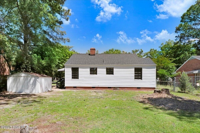 403 S Andrews Ave, Goldsboro, NC 27530 - rear view of property with crawl space and a chimney